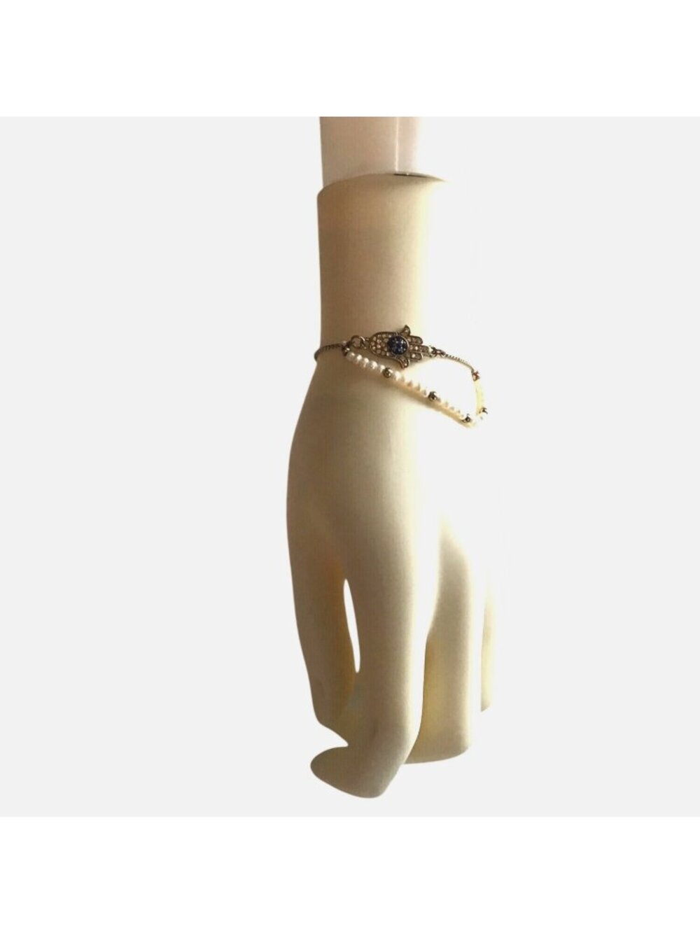 WOMENS ADJUSTABLE BRACELET WITH PEARLS AND EVIL EYE/HAND CHARM